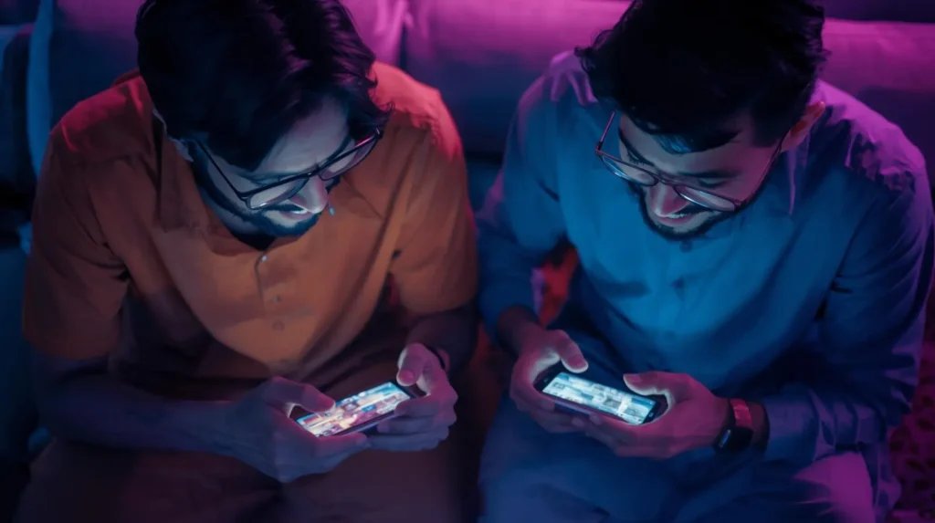 Pakistani users playing game on phone
